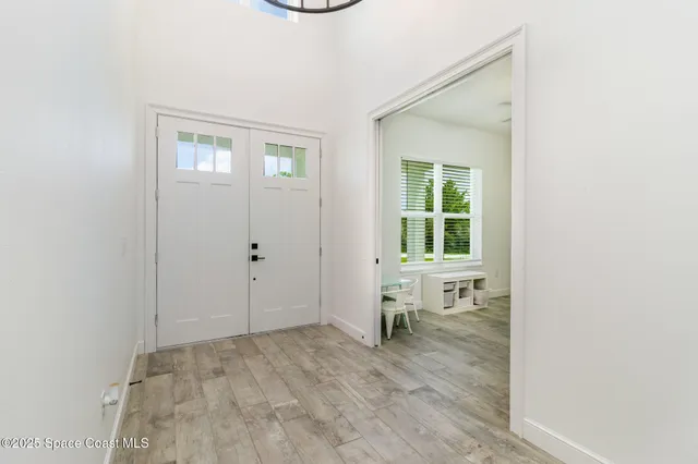 an empty room with windows