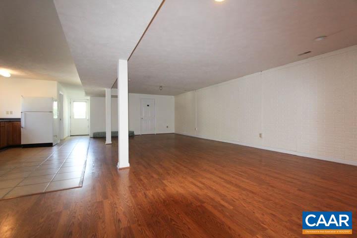 376 North Ridge Way Ruckersville, VA 22968 - Photo 11 of 16 a view of a hallway with wooden floor
