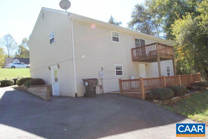 376 North Ridge Way Ruckersville, VA 22968 - Photo 14 of 16 a view of a house with a backyard