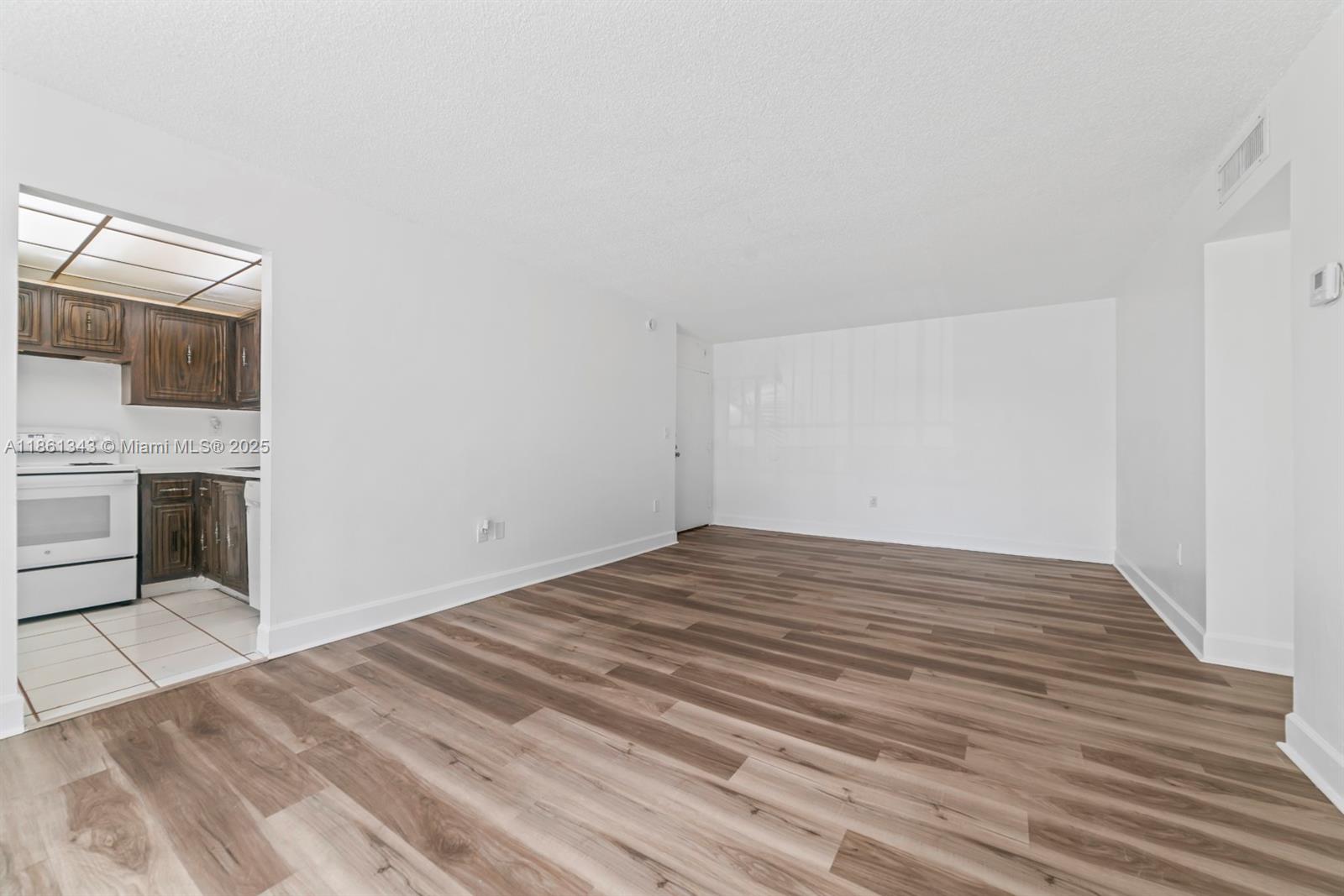 498 Northwest 165th Street, Unit D201 Miami, FL 33169 - Photo 4 of 20