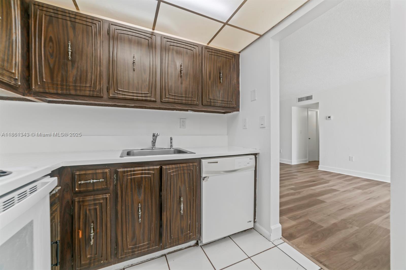 498 Northwest 165th Street, Unit D201 Miami, FL 33169 - Photo 7 of 20