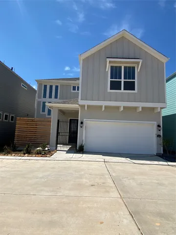 a view of house with yard