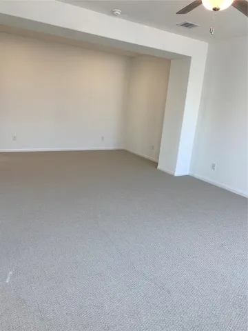 an empty room with a bench