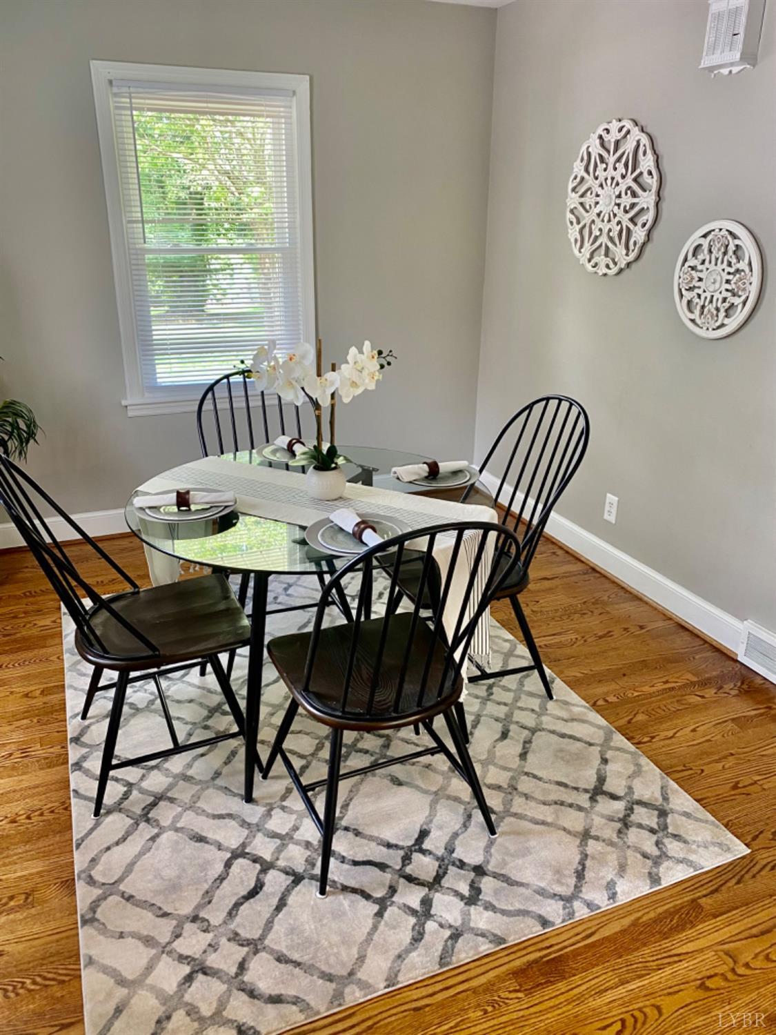 2412 Old Forest Road Lynchburg, VA 24501 - Photo 12 of 29 a view of a dining room with furniture and a window