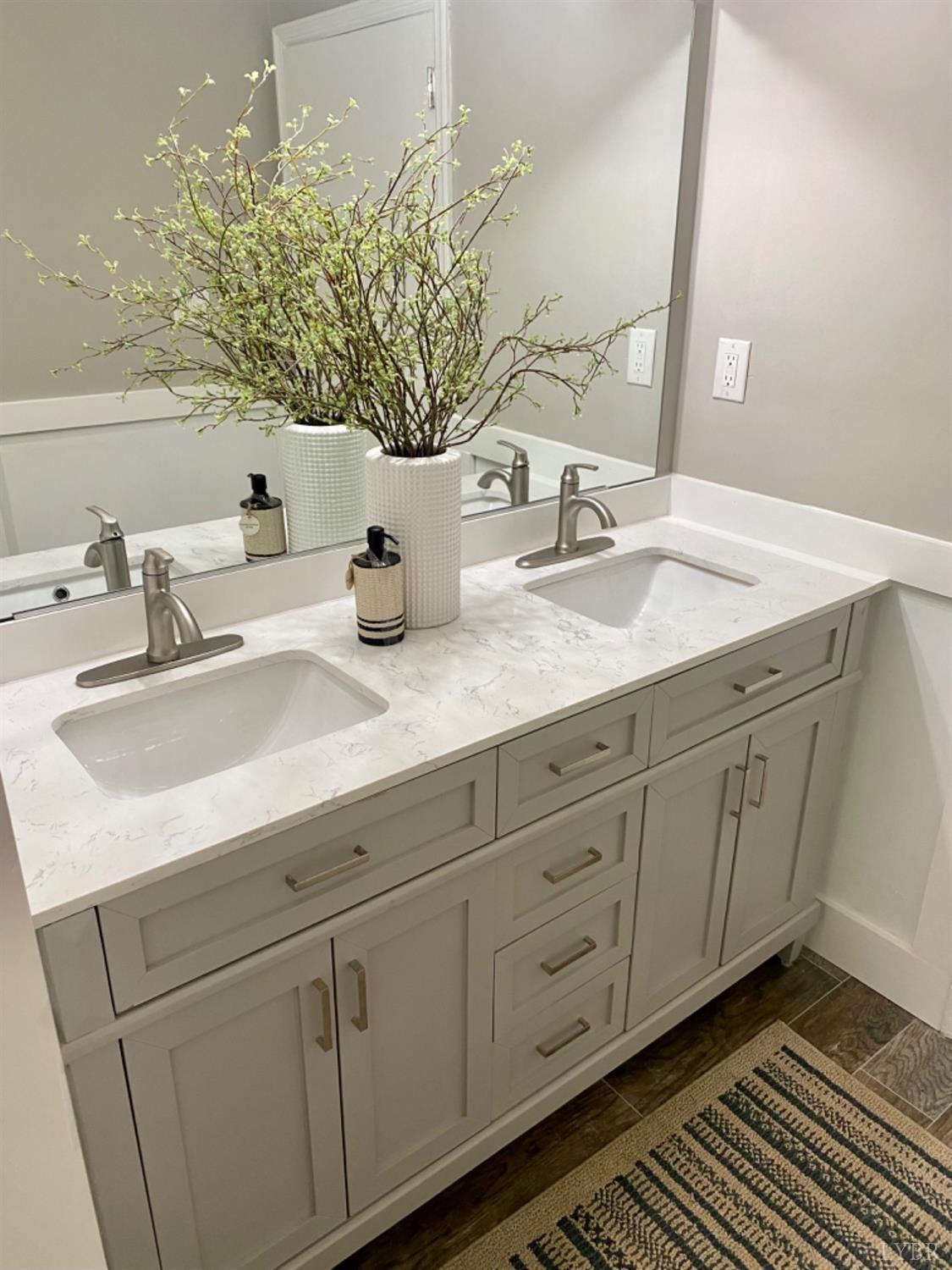 2412 Old Forest Road Lynchburg, VA 24501 - Photo 16 of 29 a bathroom with a sink and a mirror