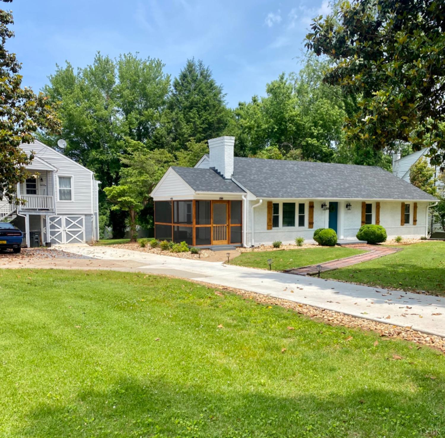 2412 Old Forest Road Lynchburg, VA 24501 - Photo 2 of 29 a front view of a house with a yard