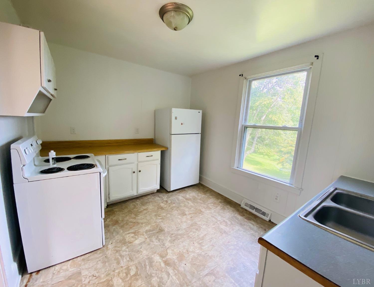 2412 Old Forest Road Lynchburg, VA 24501 - Photo 25 of 29 a utility room with dryer and washer