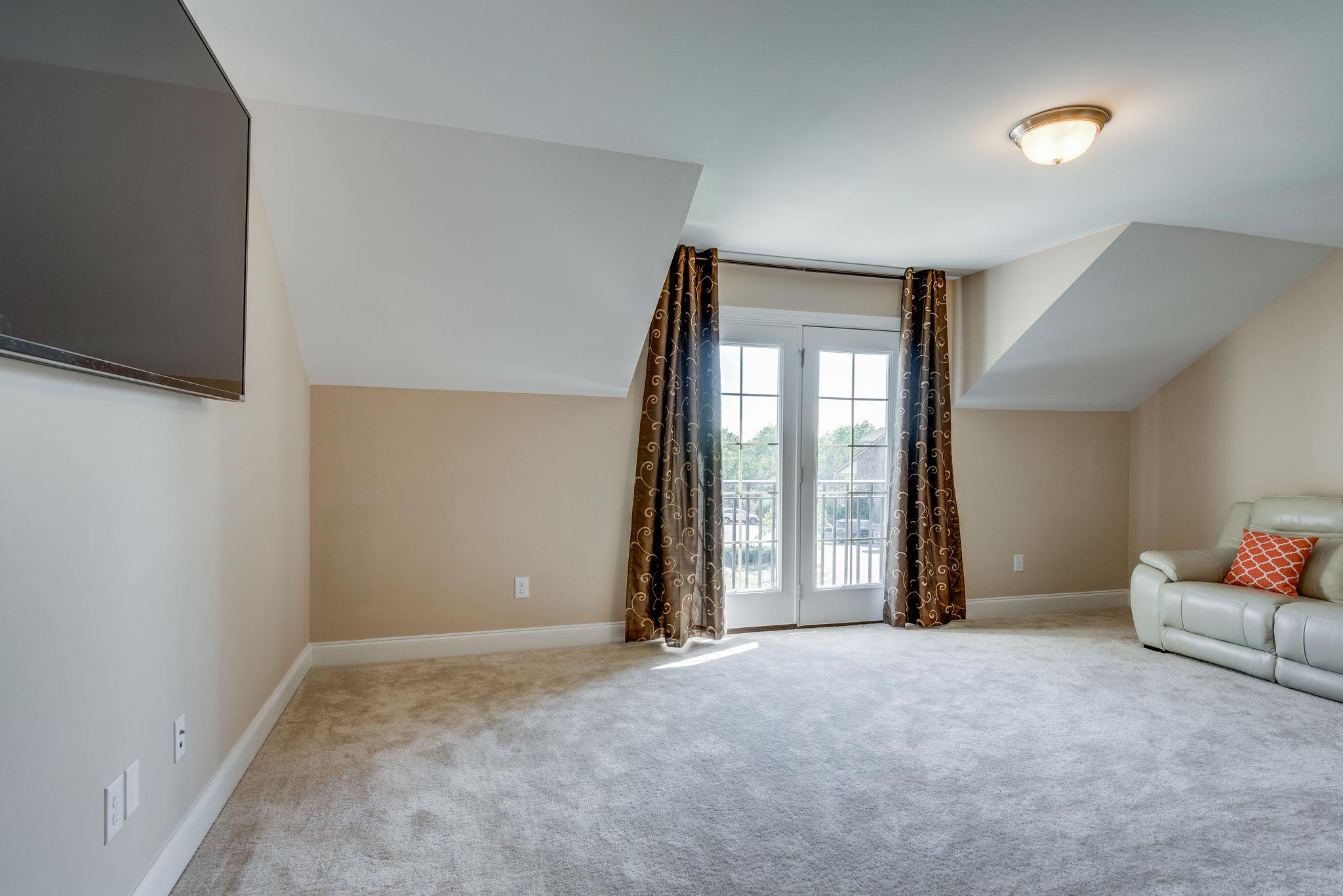 360 Old Stone Road Goodlettsville, TN 37072 - Photo 24 of 28 an empty room with windows and closet