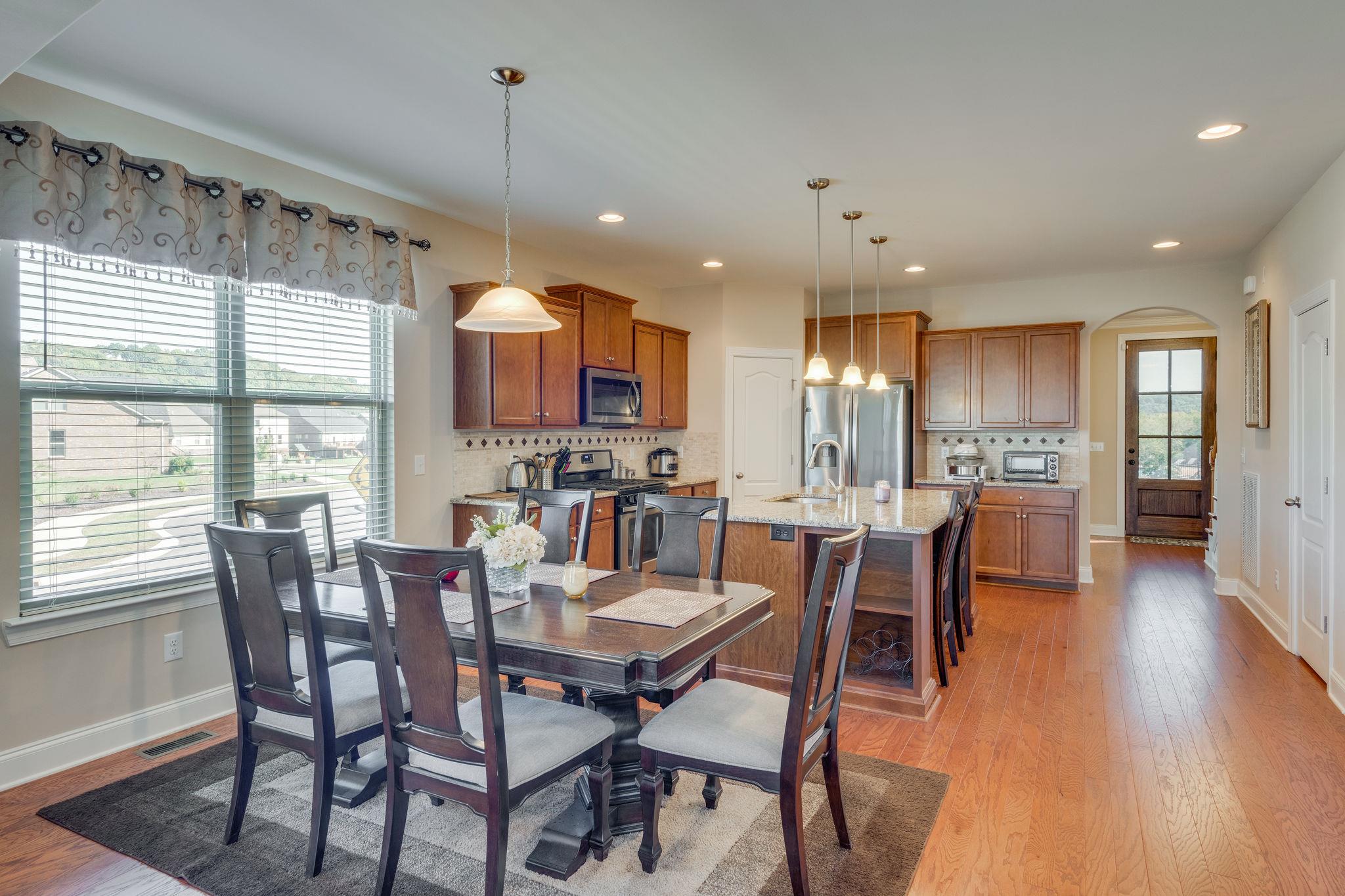 360 Old Stone Road Goodlettsville, TN 37072 - Photo 10 of 28 a view of a dining room with furniture window and wooden floor