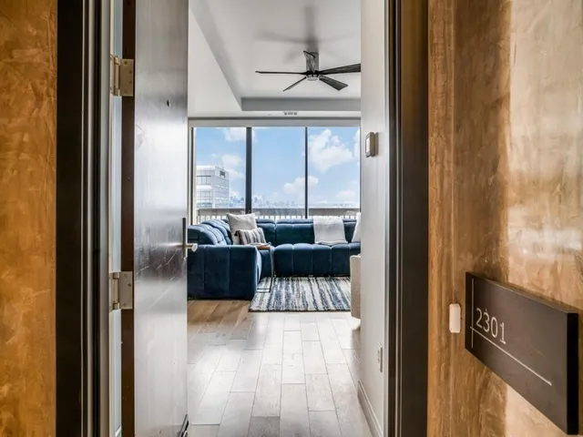 a view of living room with furniture and a window
