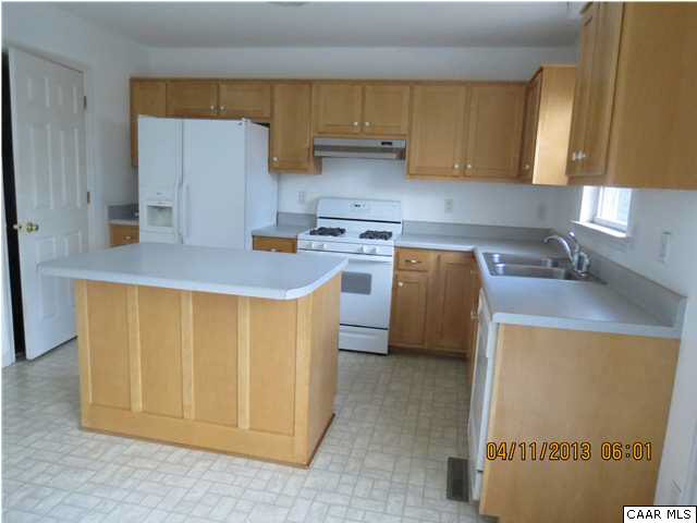 3861 Buck Island Road Charlottesville, VA 22902 - Photo 3 of 6 a kitchen with a stove a refrigerator and a sink