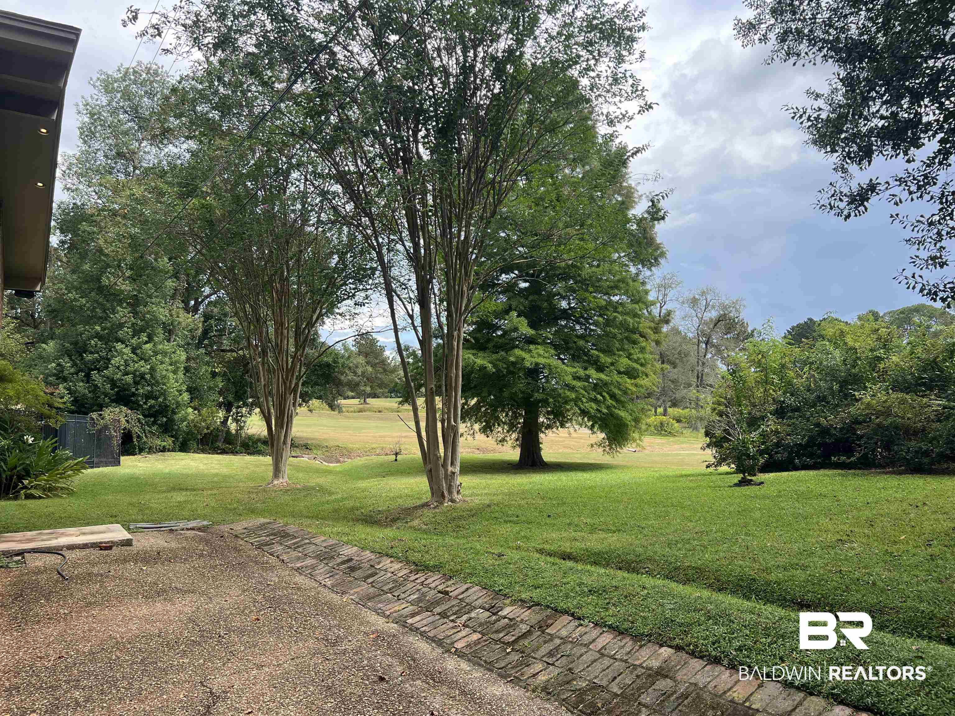 15 Spring Bank Road Mobile, AL 36608 - Photo 56 of 58 View of green lawn