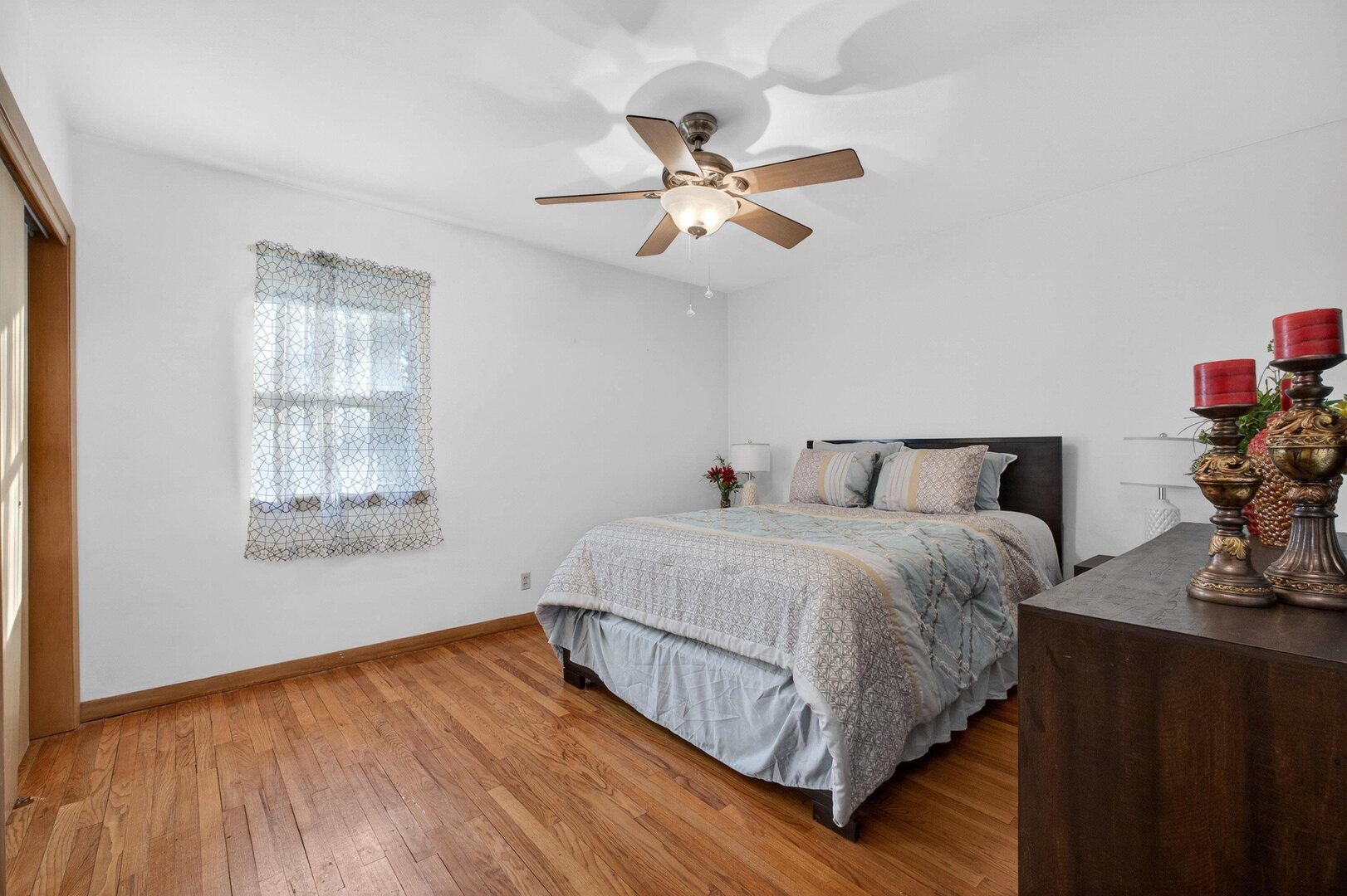 4318 5th Street East Moline, IL 61244 - Photo 20 of 30 a bedroom with a bed and window