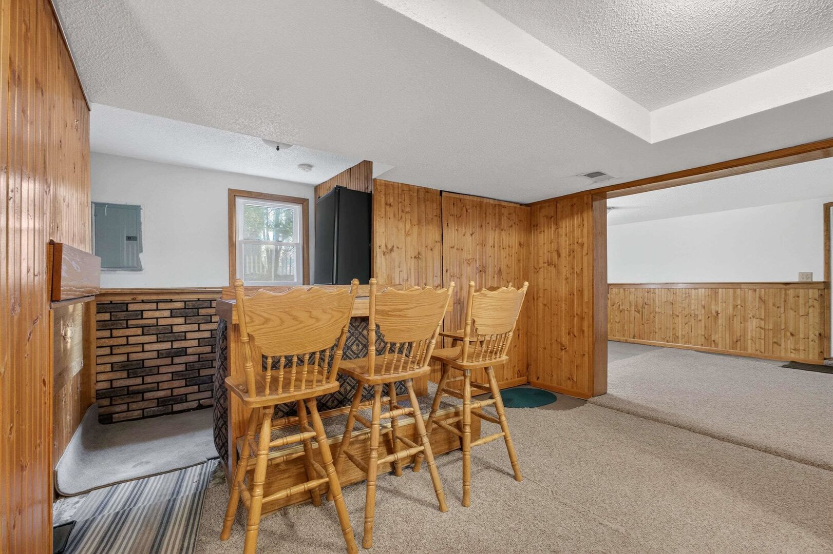 4318 5th Street East Moline, IL 61244 - Photo 22 of 30 a view of a livingroom with furniture and window
