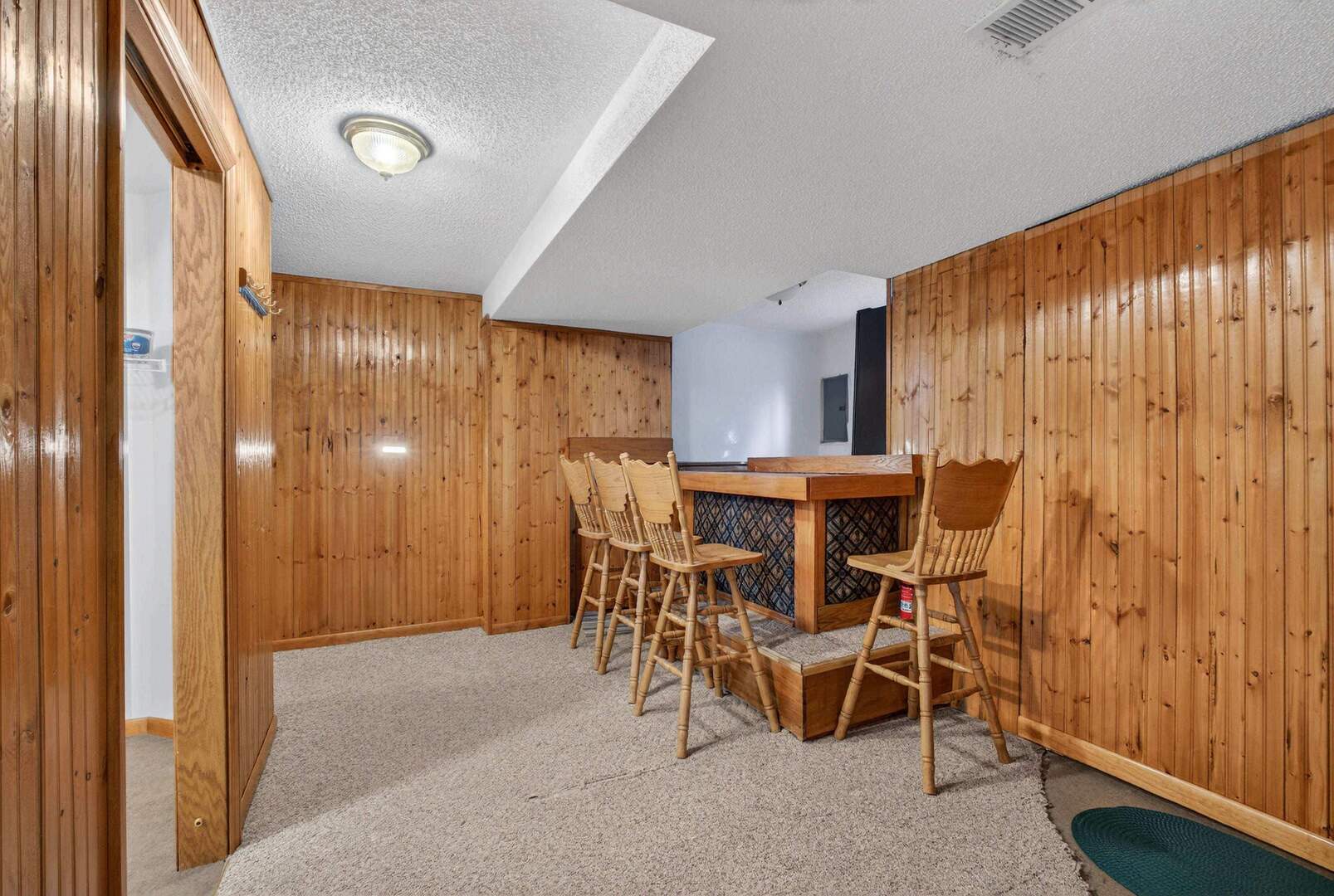 4318 5th Street East Moline, IL 61244 - Photo 24 of 30 a view of a dining room with furniture and chandelier
