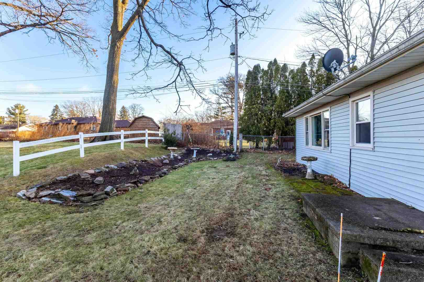 4318 5th Street East Moline, IL 61244 - Photo 30 of 30 a view of a house with backyard and sitting area