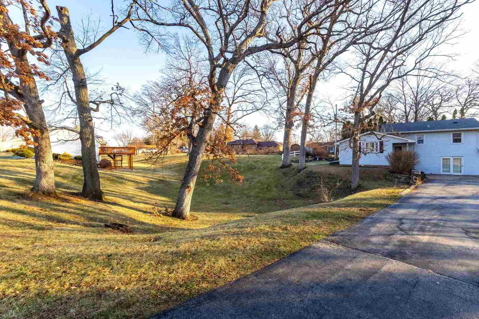 4318 5th Street East Moline, IL 61244 - Photo 3 of 30 a view of yard with tree