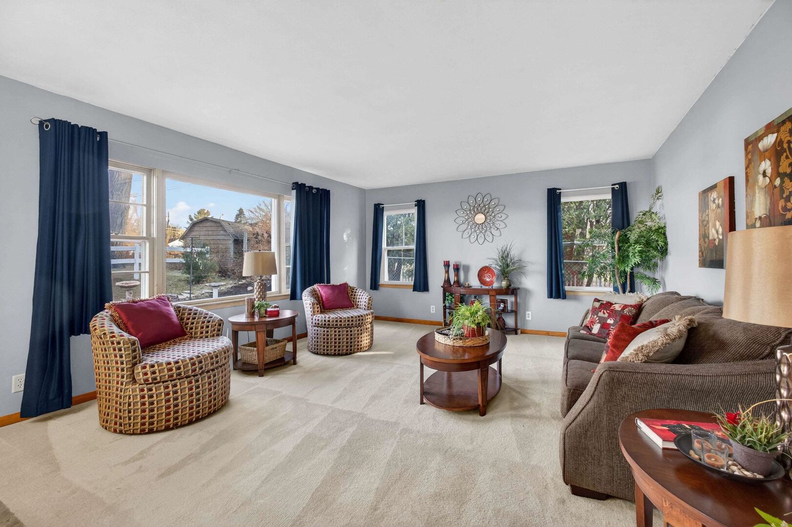 4318 5th Street East Moline, IL 61244 - Photo 8 of 30 a living room with furniture and a large window