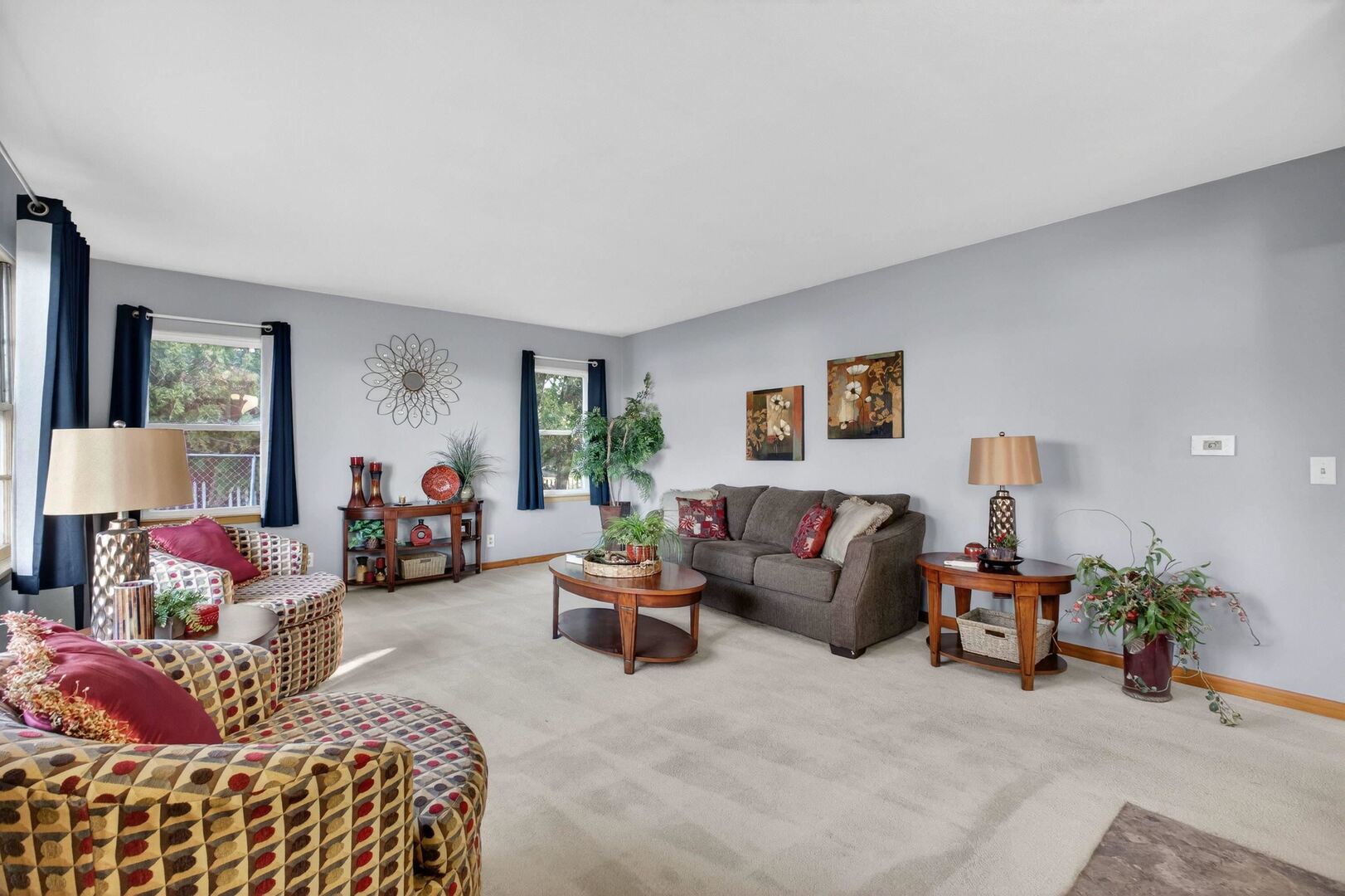 4318 5th Street East Moline, IL 61244 - Photo 9 of 30 a living room with furniture and a lamp