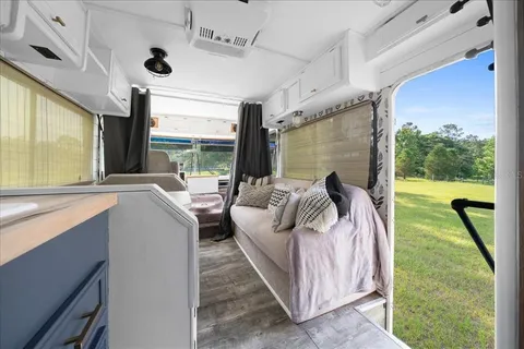 a living room with patio furniture