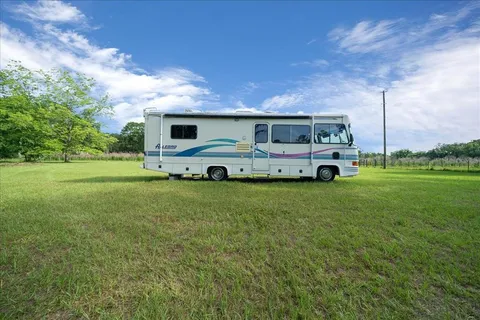 a bus parked in front of a house