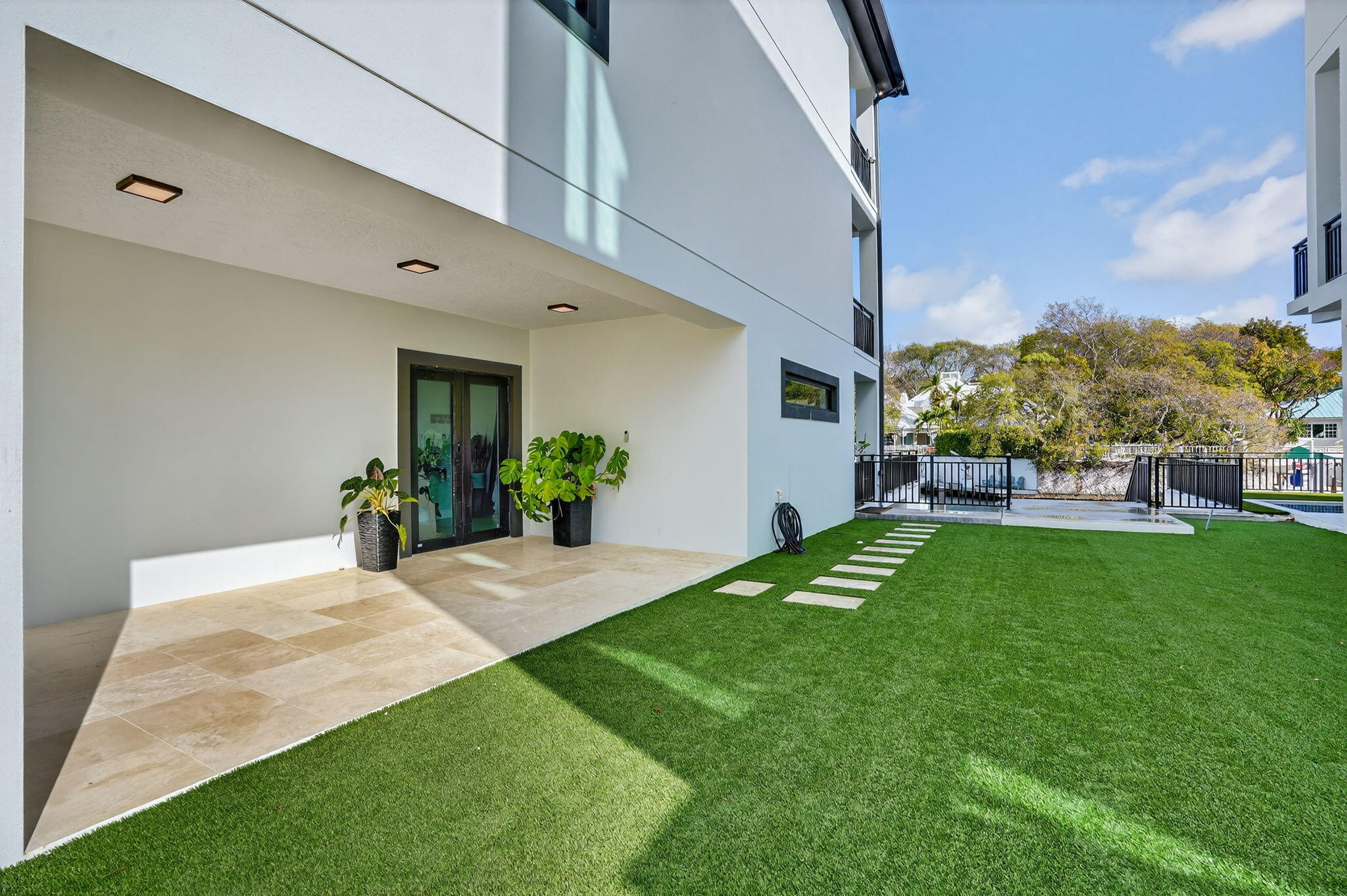 14 Bass Avenue Key Largo, FL 33037 - Photo 58 of 66 Turf with pavered path to dock