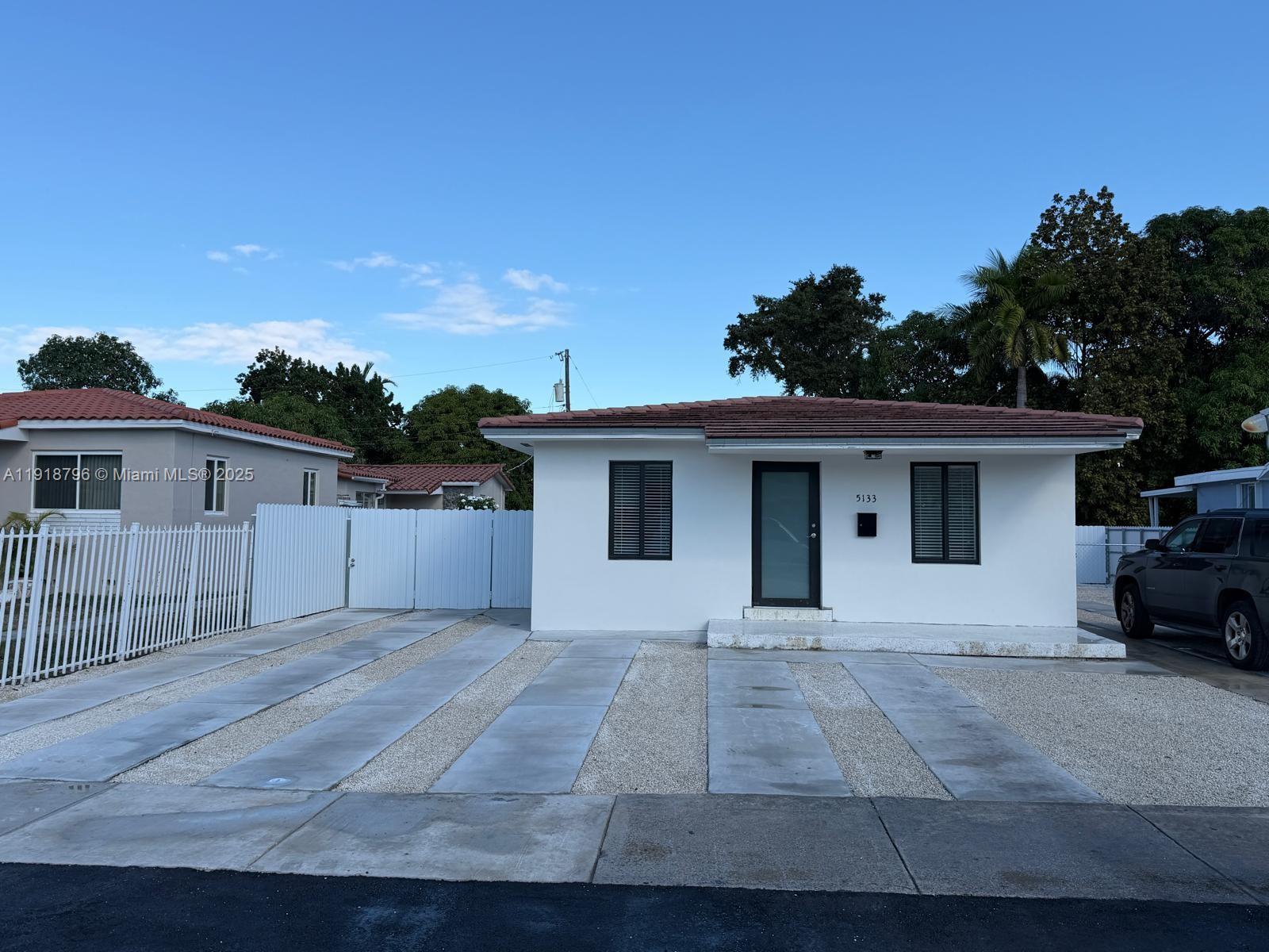 5133 Northwest 4th Street, Unit 1 Miami, FL 33126 - Photo 1 of 11 a view of house and outdoor space