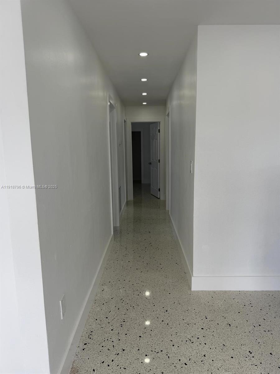 5133 Northwest 4th Street, Unit 1 Miami, FL 33126 - Photo 4 of 11 a view of hallway