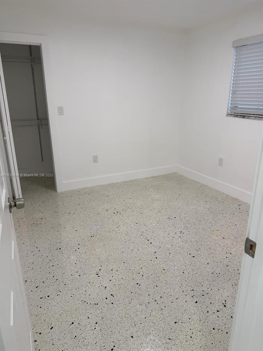 5133 Northwest 4th Street, Unit 1 Miami, FL 33126 - Photo 7 of 11 a view of empty room
