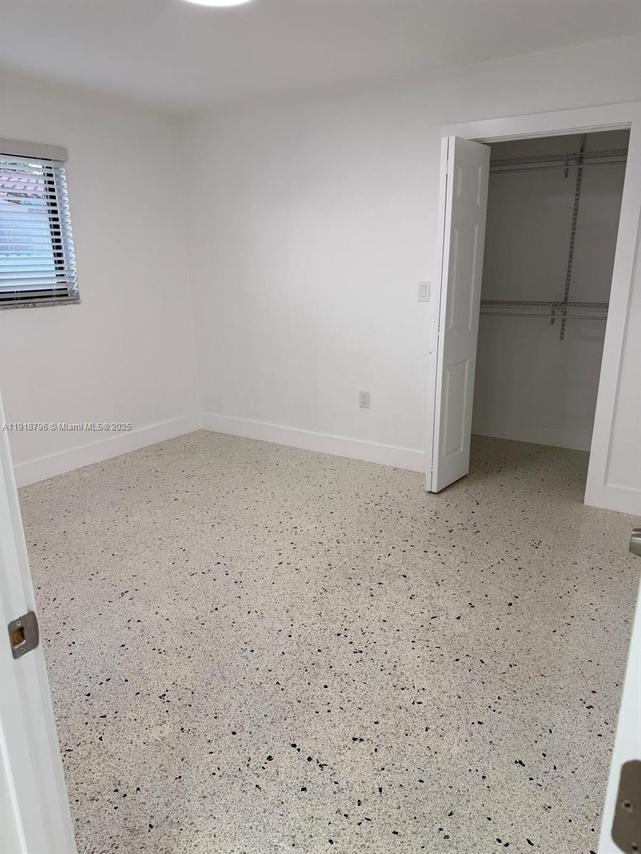 5133 Northwest 4th Street, Unit 1 Miami, FL 33126 - Photo 8 of 11 a view of an empty room