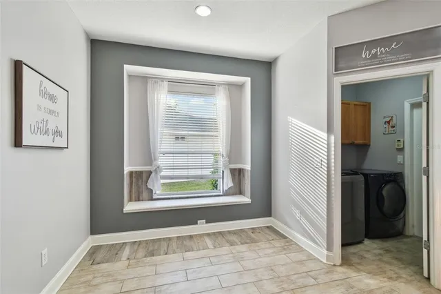 a en suite bathroom with a sink and a mirror