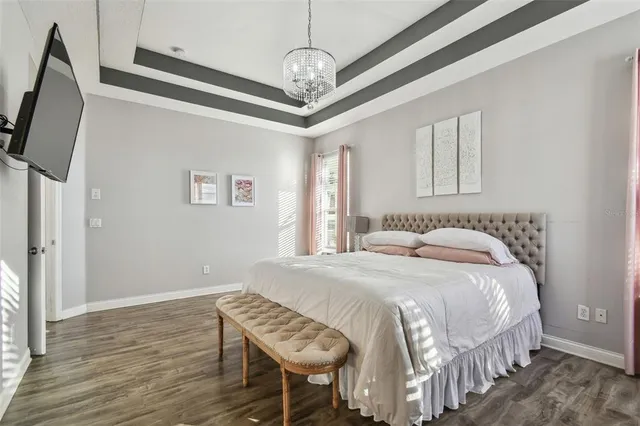 a view of a backyard with swimming pool