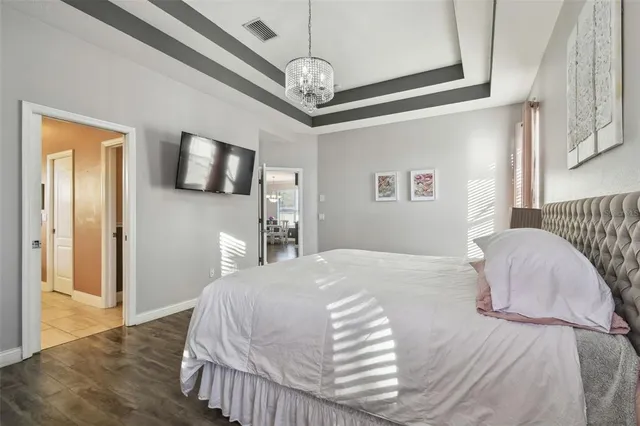 a view of a backyard with table and chairs