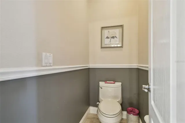 an aerial view of residential houses with outdoor space and swimming pool