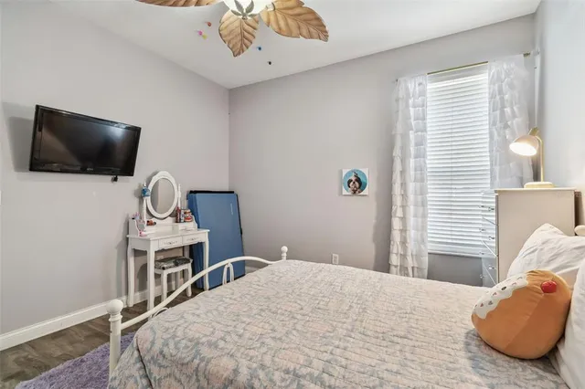 an aerial view of residential houses with outdoor space and river