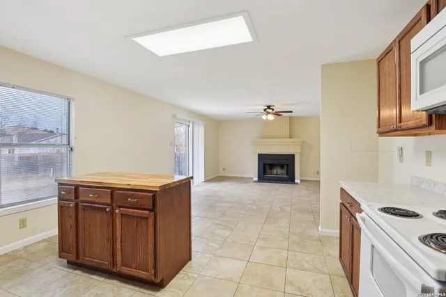a kitchen with a stove and a sink