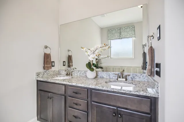 a bathroom with a toilet and a sink