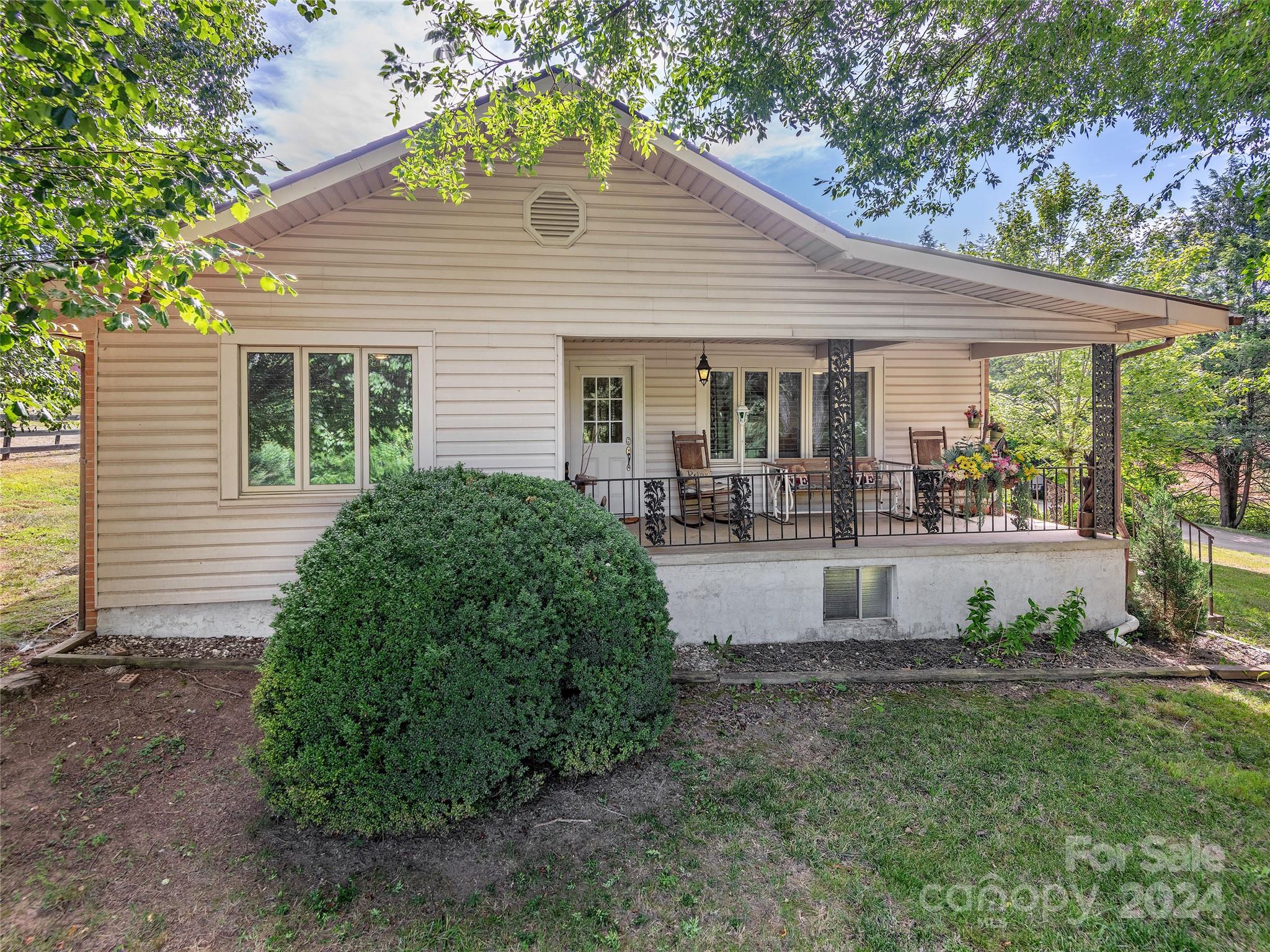 2356 Panther Creek Road Clyde, NC 28721 - Photo 3 of 22 a view of a house with backyard and sitting area