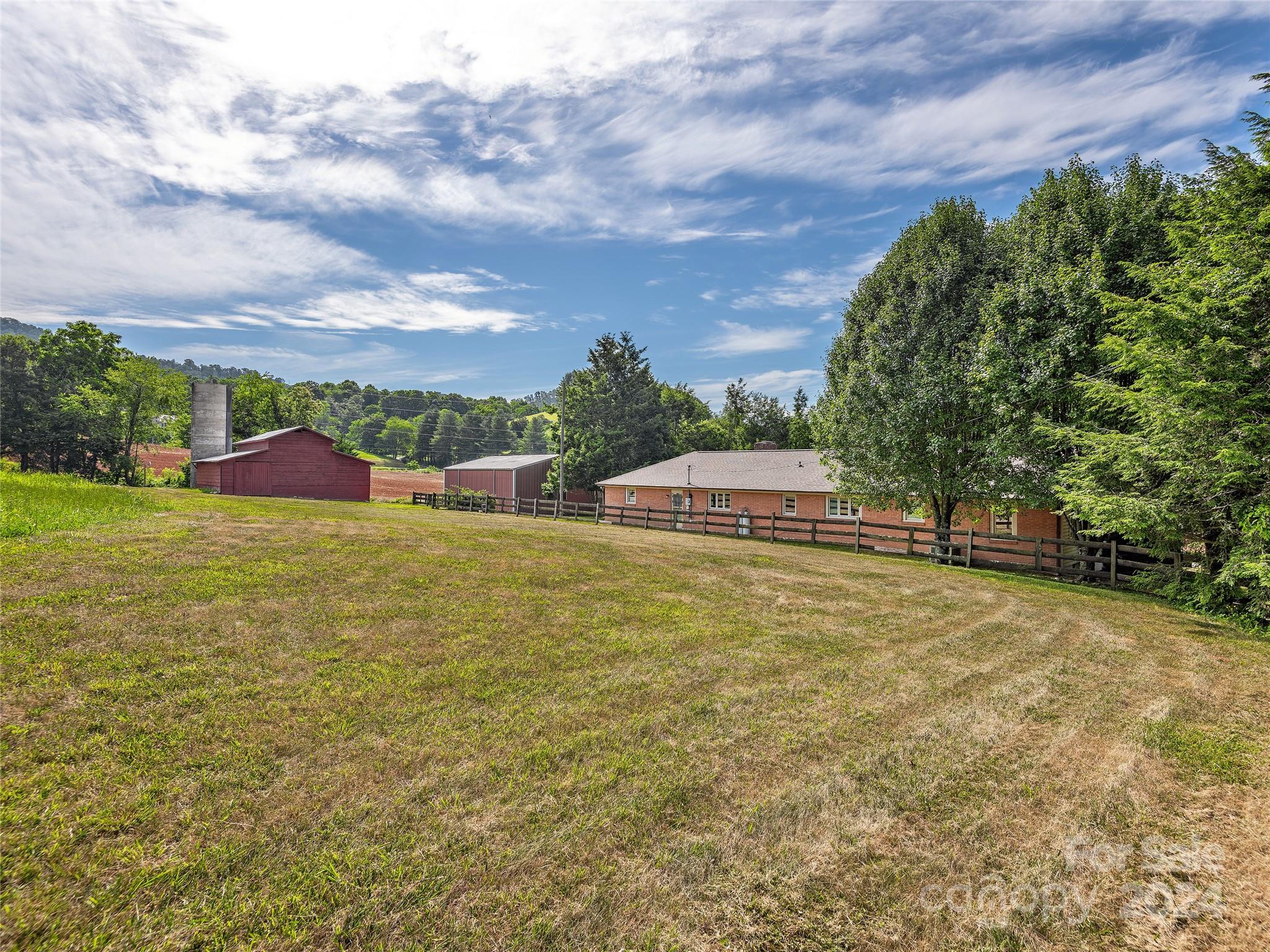2356 Panther Creek Road Clyde, NC 28721 - Photo 5 of 22 a view of an outdoor space and swimming pool