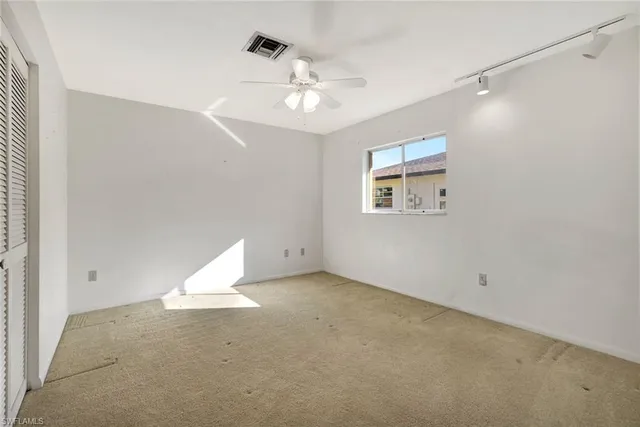 a utility room with cabinets