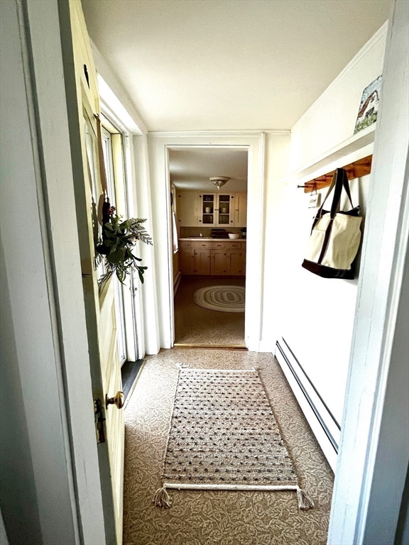 13 Wilson Street Clinton, MA 01510 - Photo 11 of 23 a bedroom with a bed and a rug