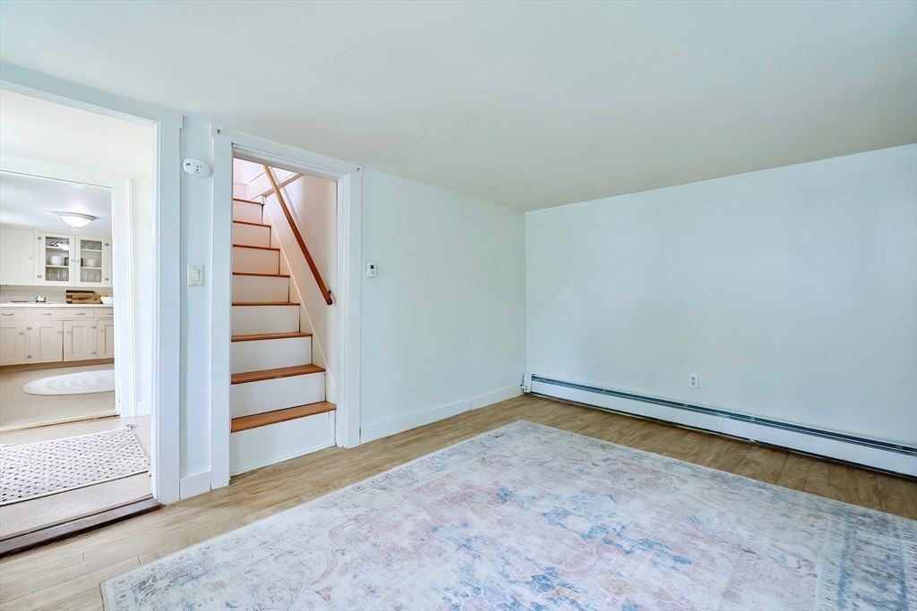 13 Wilson Street Clinton, MA 01510 - Photo 13 of 23 a view of an empty room with stairs