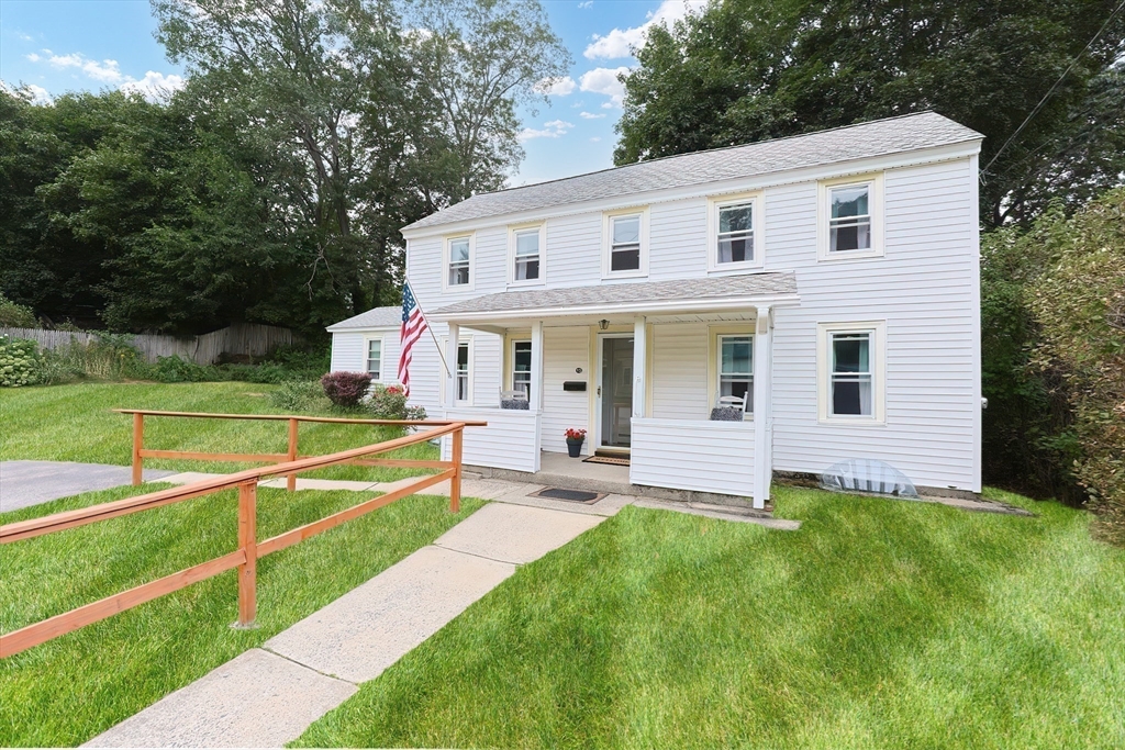 13 Wilson Street Clinton, MA 01510 - Photo 23 of 23 a view of a house with a yard and sitting area