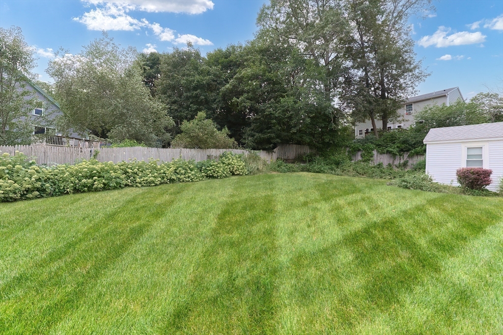 13 Wilson Street Clinton, MA 01510 - Photo 4 of 23 a view of a backyard
