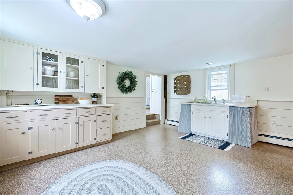 13 Wilson Street Clinton, MA 01510 - Photo 8 of 23 a spacious bathroom with a double vanity sink and a mirror
