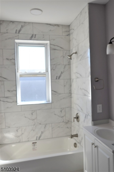 154 South Main Street Phillipsburg, NJ 08865 - Photo 11 of 12 a bathroom with a bathtub and a shower