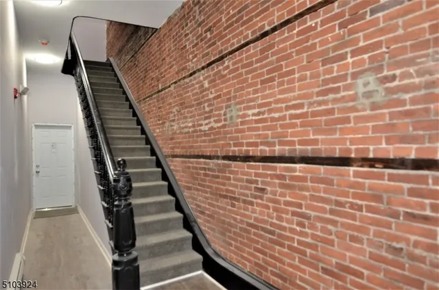 a view of wooden staircase with staircase