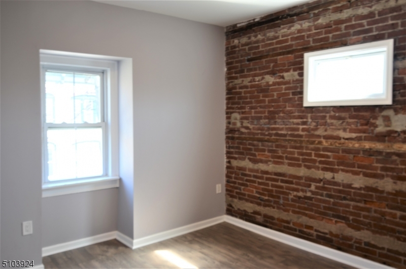 154 South Main Street Phillipsburg, NJ 08865 - Photo 10 of 12 a view of an empty room and wooden floor
