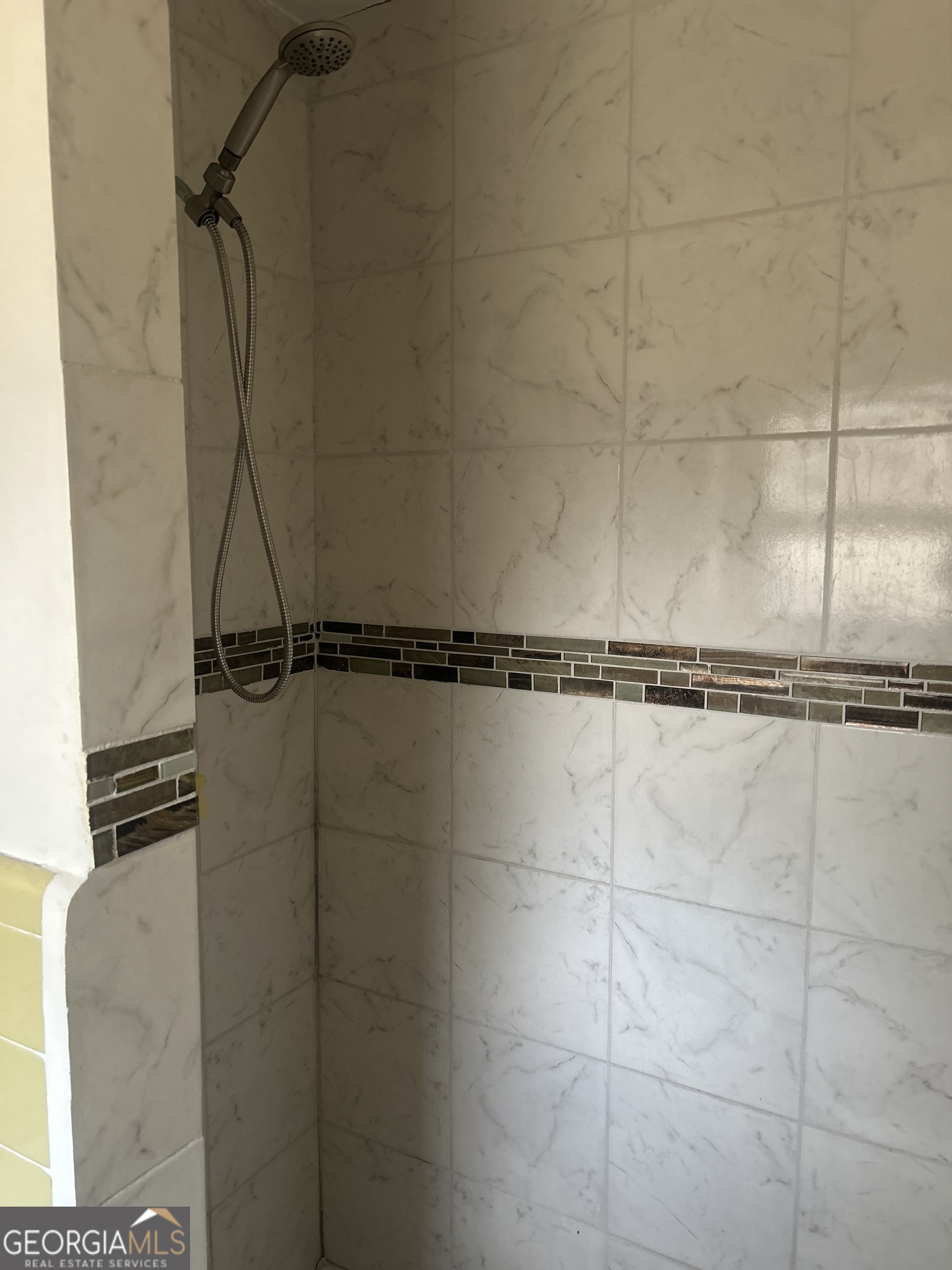 1406 Canterbury Road Griffin, GA 30223 - Photo 26 of 26 a bathroom with a shower