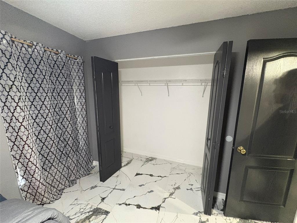 3123 East Marcia Street Inverness, FL 34453 - Photo 16 of 32 a bathroom with a bathtub and shower